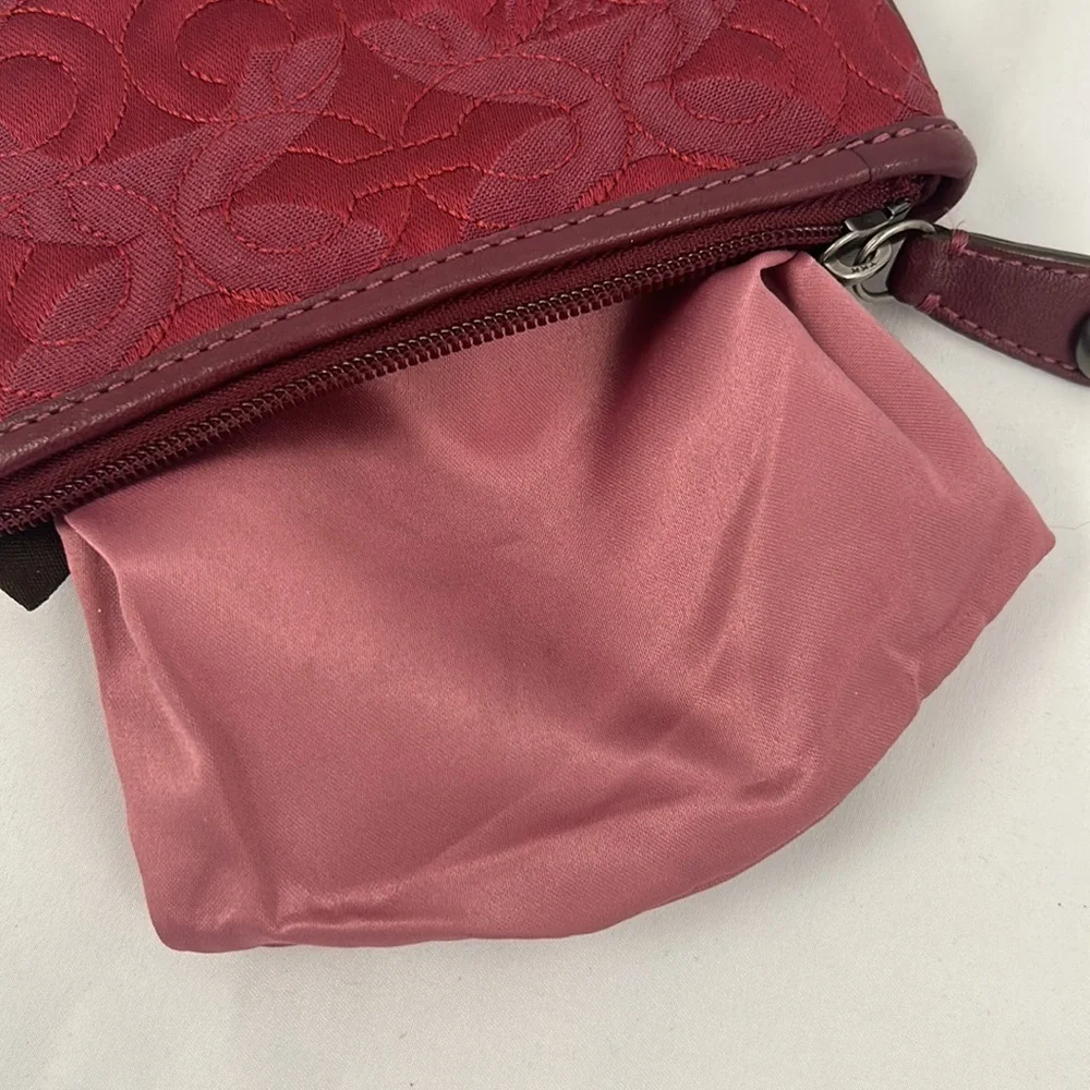 Coach compact clutch